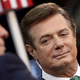 Paul Manafort, Donald Trump’s then-campaign manager, is interviewed by John Dickerson on the floor of the Republican National Convention on July 17, 2016